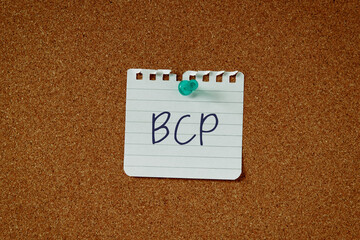 There is a piece of paper with the word BCP. It is an abbreviation for Business Continuity Plan as...