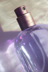 Cosmetic fragrance tropical style glass bottle on shadow background