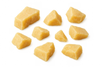 Parmesan cheese pieces falling dynamically, revealing golden edges and crumbly texture against white translucent surface