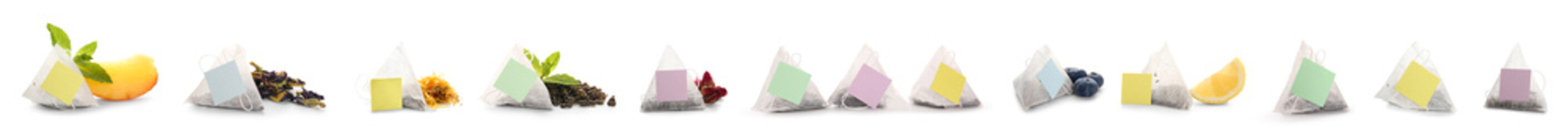 Set of different tea bags on white background
