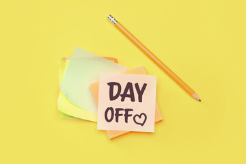 Sticky note with text THANK YOU, drawn heart and pencil on yellow background