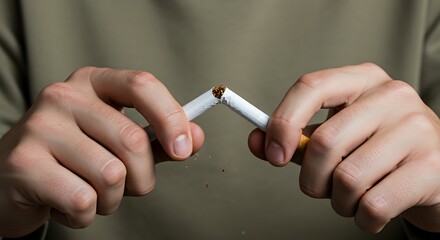 Breaking Free Hands Snapping a Cigarette to Quit Smoking, Representing Healthy Choices