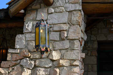Lantern detail at the entrance to the historic log and stone guest lodge on the north rim of Grand...