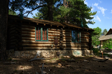 Original historic log guest cabin at the lodge on the north rim of Grand Canyon National Park,...