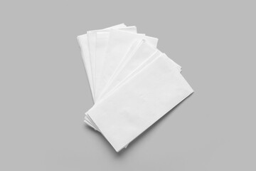 Fototapeta premium Paper napkins on grey background