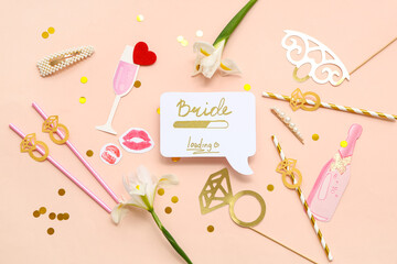 Speech bubble with text BRIDE LOADING and decor for Hen Party on beige background