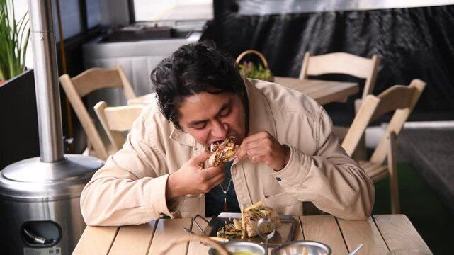 Man eating a burrito
