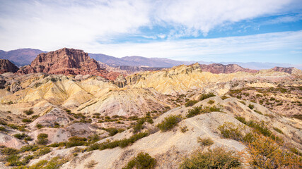 BEAUTIFUL MOUNTAIN LANDSCAPE, COLORFUL ROCKY, ARID, WITH YELLOW ROCKS AND RED ROCKS, IN SANTA MARIA CATAMARCA ARGENTINA