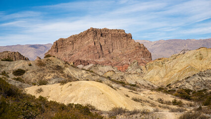 BEAUTIFUL MOUNTAIN LANDSCAPE, COLORFUL ROCKY, ARID, WITH YELLOW ROCKS AND RED ROCKS, IN SANTA MARIA CATAMARCA ARGENTINA