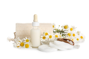 Loofah sponge, bottle of cosmetic product and chamomile flowers isolated on white background, closeup