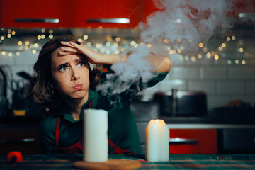 Woman Exasperated by Candles That Emit Too Much Smoke. Unhappy party host fearing fire hazard with...