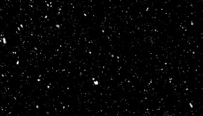 Falling snow against a black background