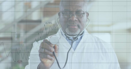 Senior doctor analyzing data on glass panel with overlay in lab, wearing lab coat and stethoscope