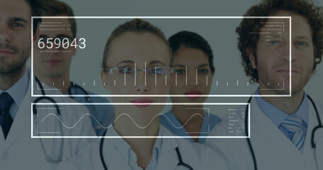Standing healthcare team wearing lab coats and stethoscopes in corridor, displaying HUD graphics