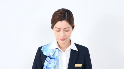 お辞儀する女性店員・受付スタッフ