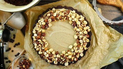 A delicious dessert, Coffee Hazelnut Cream Tart.  Made with espresso powder, chocolate crust and loaded with crushed hazelnuts. A sweet treat that goes great with coffee.