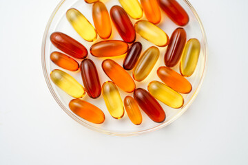 Vitamins capsules, fish oil, soft gels, supplements, omega 3, omega 9, vitamin D, vitamin E
