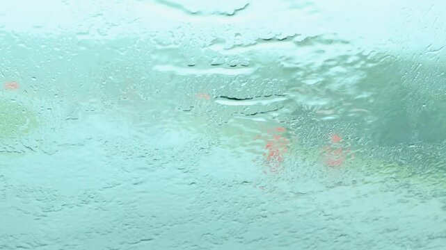 POV View Through Windshield Driving in Heavy Rainstorm 259