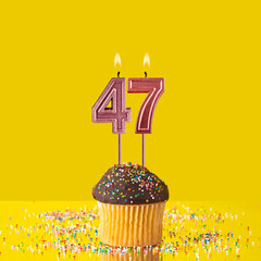 Birthday on a yellow background - Number 47 candle