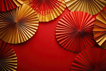 Paper fans, gold and red, festive design on crimson backdrop