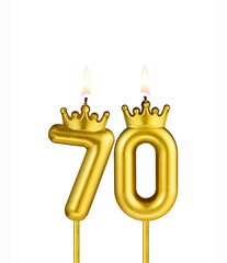 Golden number 70 birthday candle on white background