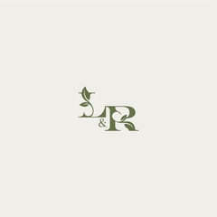 bold initial concept luxury wedding monogram design LR organic leaf logo letter