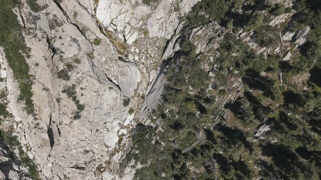 Aerial-Top down small waterfall-Granite mountain side