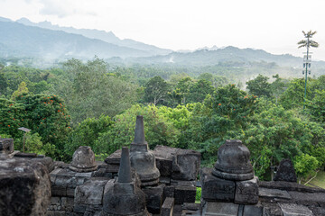 Tranquil Landscape View from Ancient Stone Structure towards Green Forest Mountain