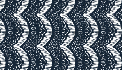 All-over seamless fabric adorned with fringed lace edging