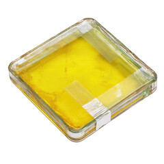 Square glass dish, yellow liquid inside