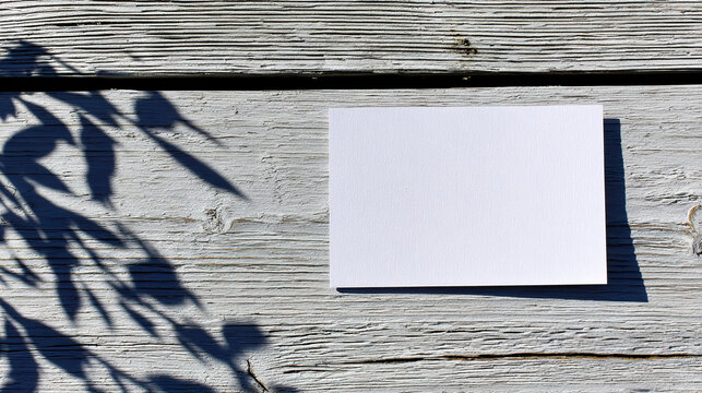 A blank notecard on light wood, embodying simplicity and natural beauty.
