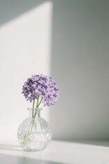 Bouquet of purple flowers in a vase © Tina