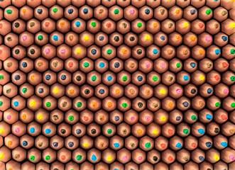Colorful Close-Up of Assorted Pencil Tips Arranged in a Hexagonal Pattern
