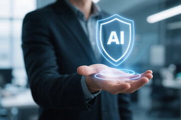 Man in suit holding ai shield hologram in hand for artificial intelligence protection concept