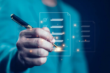 Electronic signature Businessman signs electronic document on digital document on page Electronic...