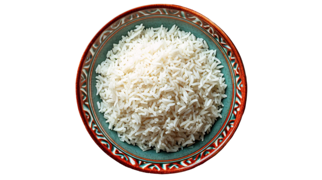 A top view of a bowl full of cooked white rice with a decorative rim against a black background