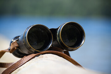 Vintage Binoculars on a Sunny Outdoor Natural Background