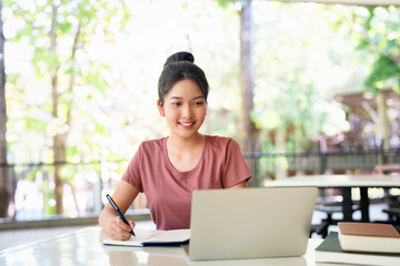 Education, writing notes and girl in college for knowledge, assignment project or learning. Book,...