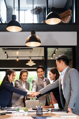 Hands, stack and group of business people in office for team building, motivation and solidarity....