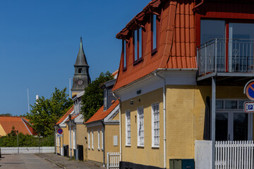 Skagen, Denmark A view of old buildings in the downtown and the Skagen Church.