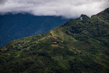 Lush Green Mountain Landscape with Rolling Hills

