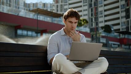 Happy shocked Caucasian man using laptop computer excited good news win enjoy male working success...