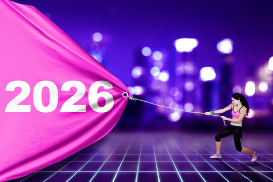 Woman Pulling 2026 into a Bright Future - Powered by Adobe