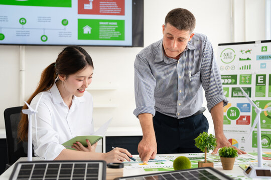 Businesspeople talk ESG strategies global warming, green finance and investment and net zero waste lifestyle. - Powered by Adobe