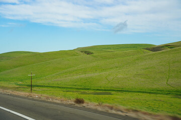 landscape with road, green hills