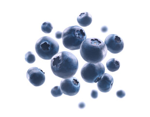 Ripe blueberries levitate on a white background