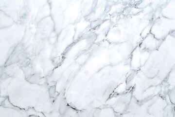 Elegant marble surface with intricate veining patterns, perfect for a luxurious design background. The intricate patterns are a testament to nature's artistry
