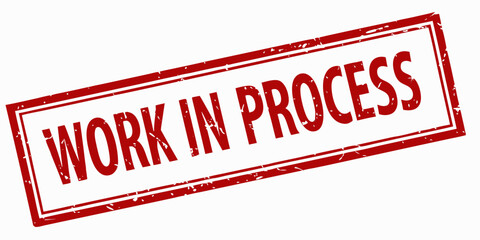 A Red Work in Process Rubber Stamp on a White Background Indicating a Project is Currently Under Development and Not Yet Complete or Finalized