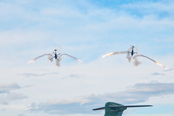 Military Helicopters Releasing Flares in Defensive Maneuver