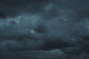 Heavy rainstorm. Dramatic dark sky filled with thick storm clouds for weather reports, climate...